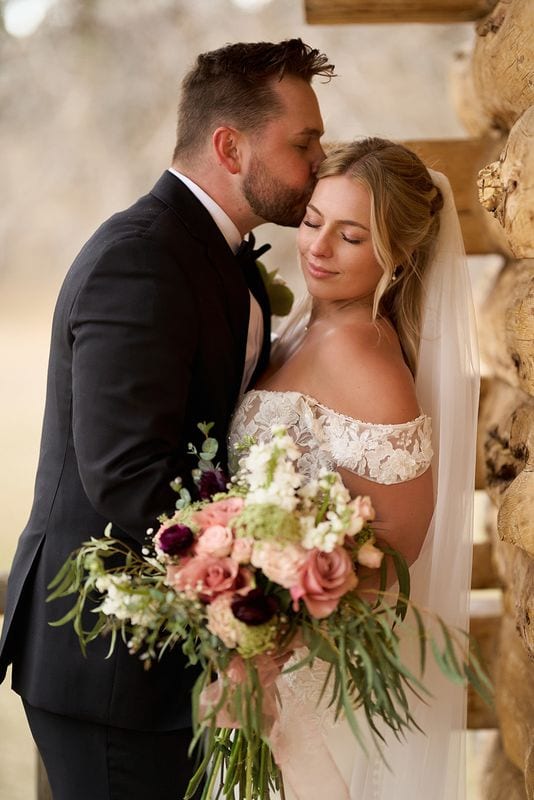 Carlee + Tayven wedding — bride + groom