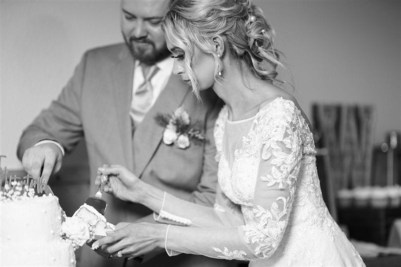Kaylie + Bailey wedding — cake cutting