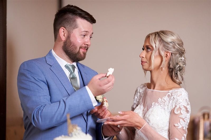 Kaylie + Bailey wedding — cake cutting