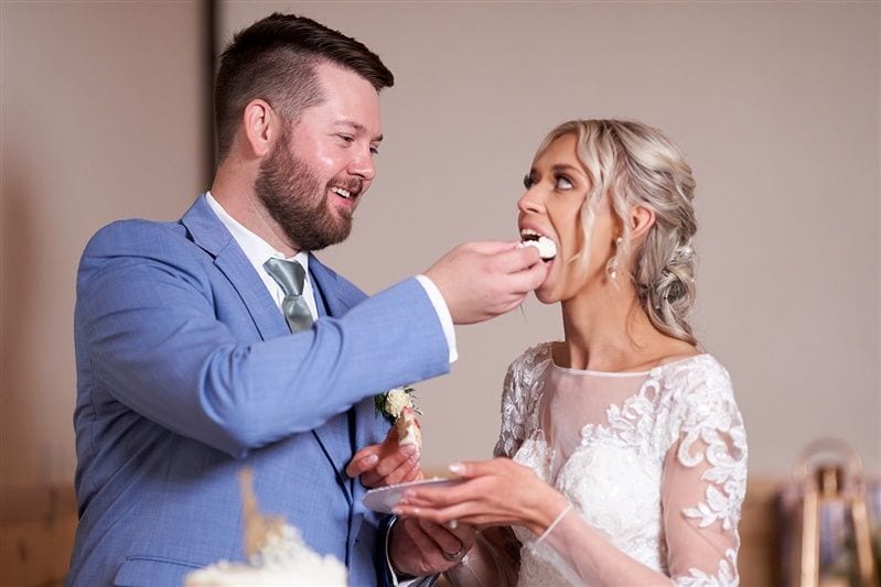 Kaylie + Bailey wedding — cake cutting