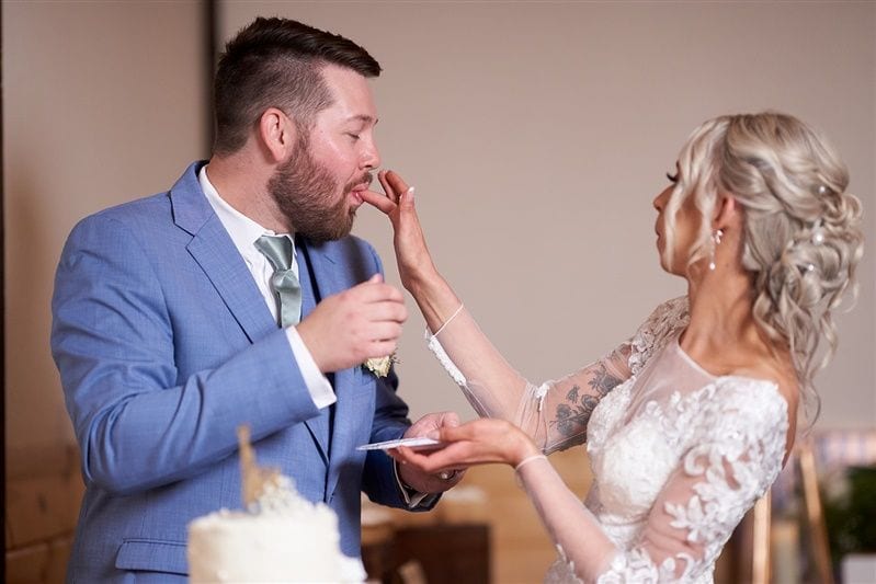Kaylie + Bailey wedding — cake cutting