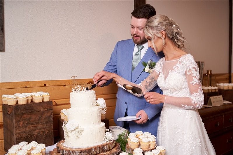 Kaylie + Bailey wedding — cake cutting