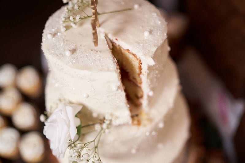 Kaylie + Bailey wedding — cake cutting