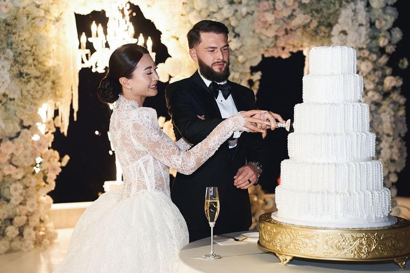 Noelle + Richie wedding — cake cutting