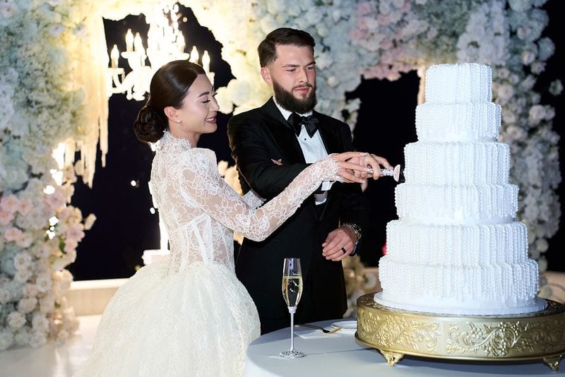 Noelle + Richie wedding — cake cutting