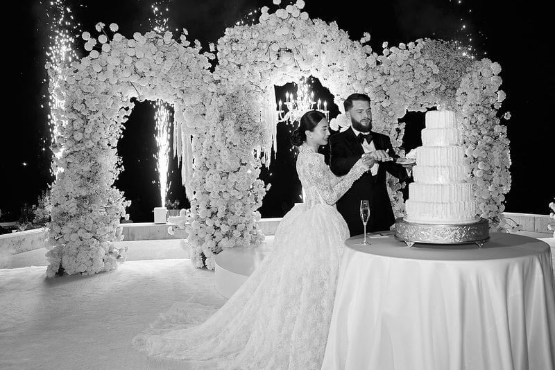 Noelle + Richie wedding — cake cutting