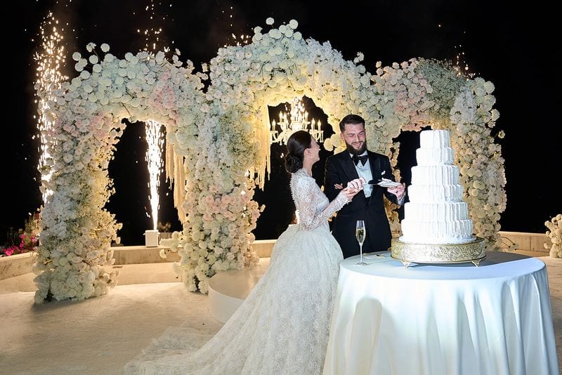 Noelle + Richie wedding — cake cutting