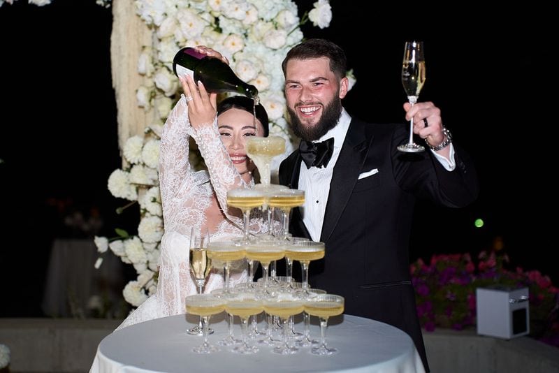 Noelle + Richie wedding — cake cutting