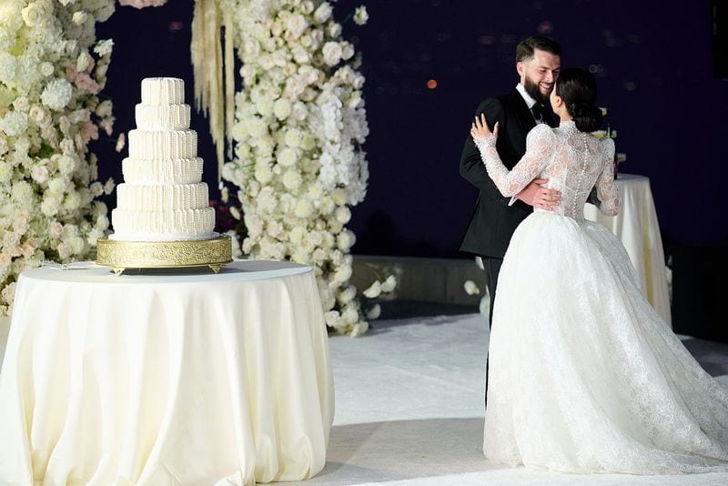 Noelle + Richie wedding — cake cutting