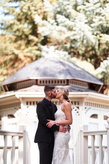 bride and groom in front of the bridal gazebo, photographed for Complete Weddings & Events, black hills receptions wedding, photographer near me, black hills wedding, fall wedding
