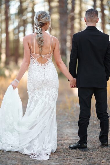 bride and groom holding hands while walking away, photographed for Complete Weddings & Events, black hills receptions wedding, photographer near me, black hills wedding, fall wedding
