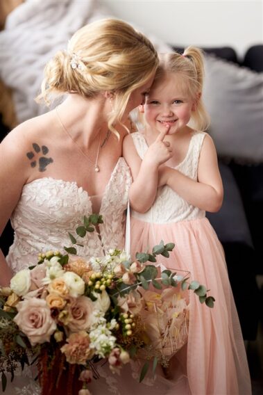 bride and flowergirl, bridal portrait, photographed for Complete Weddings & Events, black hills barn wedding, barn at aspen acres wedding, spearfish wedding