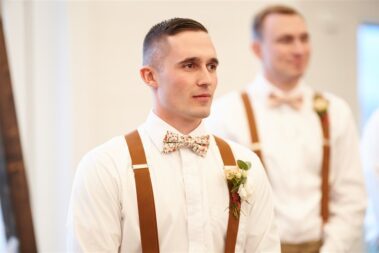groom seeing his bride, winter wedding, photographed for Complete Weddings & Events, black hills barn wedding, barn at aspen acres wedding, spearfish wedding