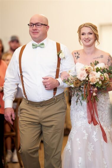 father walking daughter down aisle, winter wedding, photographed for Complete Weddings & Events, black hills barn wedding, barn at aspen acres wedding, spearfish wedding