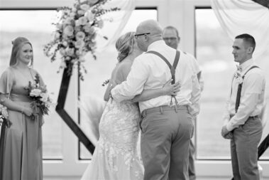 father walking daughter down aisle, winter wedding, photographed for Complete Weddings & Events, black hills barn wedding, barn at aspen acres wedding, spearfish wedding