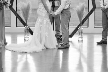 indoor wedding ceremony, winter wedding, photographed for Complete Weddings & Events, black hills barn wedding, barn at aspen acres wedding, spearfish wedding