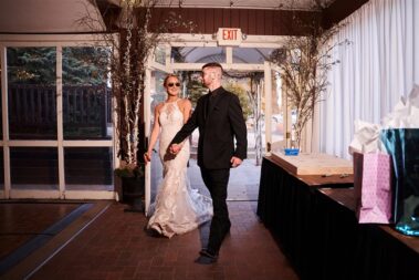 bride and groom funny grand entrance, photographed for Complete Weddings & Events, black hills receptions wedding, photographer near me, black hills wedding, fall wedding