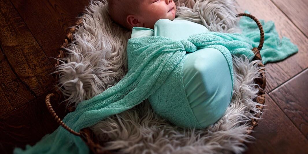 in-home newborn photos, posed newborn photography, rapid city newborn photographer