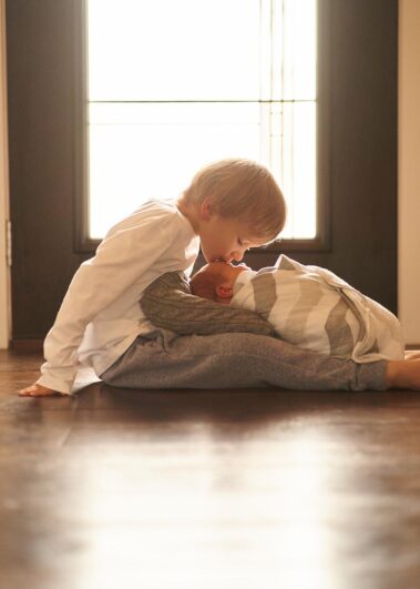 in-home newborn photos, lifestyle newborn photography, rapid city newborn photographer