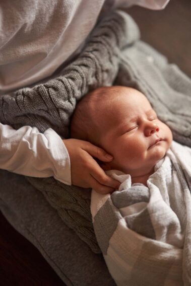 in-home newborn photos, lifestyle newborn photography, rapid city newborn photographer