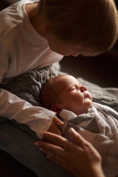 in-home newborn photos, lifestyle newborn photography, rapid city newborn photographer