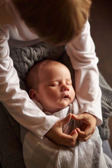 in-home newborn photos, lifestyle newborn photography, rapid city newborn photographer