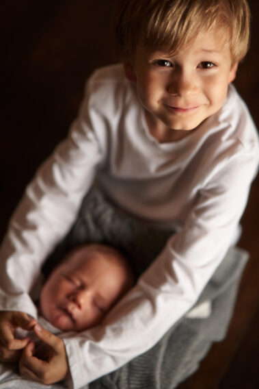 in-home newborn photos, lifestyle newborn photography, rapid city newborn photographer