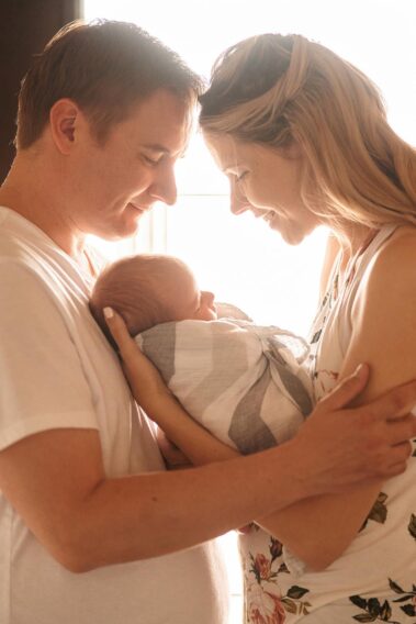 in-home newborn photos, lifestyle newborn photography, rapid city newborn photographer