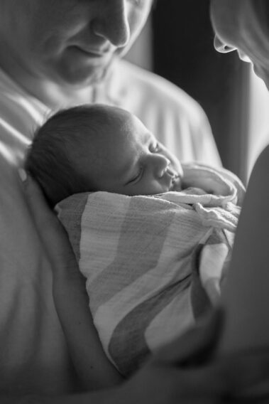 in-home newborn photos, lifestyle newborn photography, rapid city newborn photographer