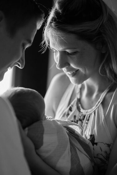 in-home newborn photos, lifestyle newborn photography, rapid city newborn photographer