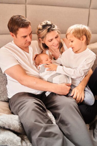 in-home newborn photos, lifestyle newborn photography, rapid city newborn photographer