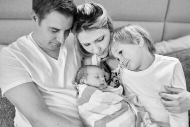 in-home newborn photos, lifestyle newborn photography, rapid city newborn photographer