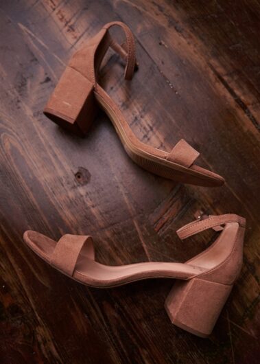 bride's shoes, winter wedding, photographed for Complete Weddings & Events, black hills barn wedding, barn at aspen acres wedding, spearfish wedding