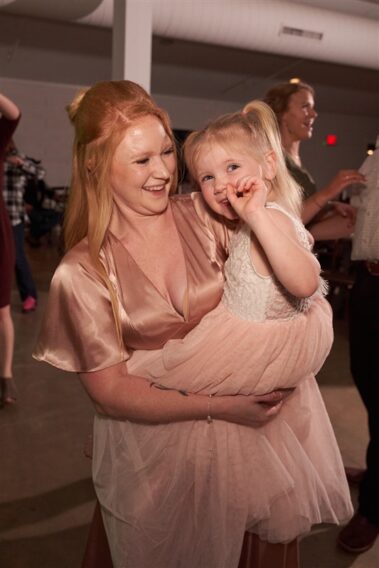 wedding guests dancing, winter wedding, photographed for Complete Weddings & Events, black hills barn wedding, barn at aspen acres wedding, spearfish wedding