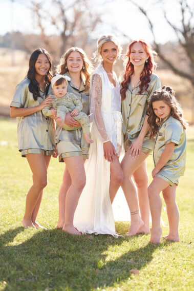 Bridal party smiling at camera