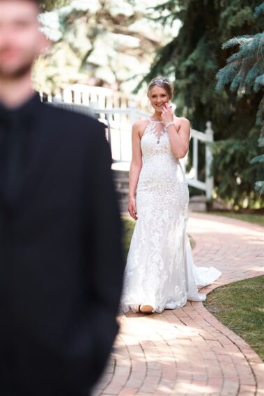 bride approaching groom for first look at black hills receptions