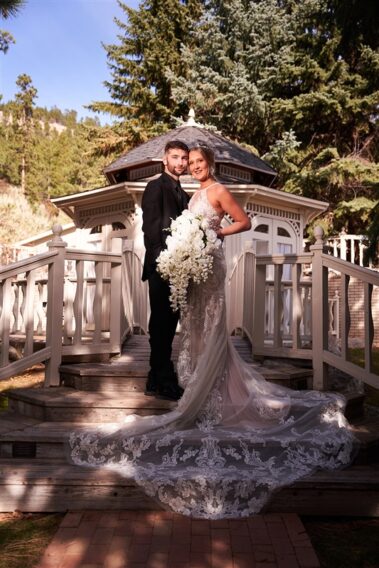 bride and groom at black hills receptions wedding in front of bridal gazebo