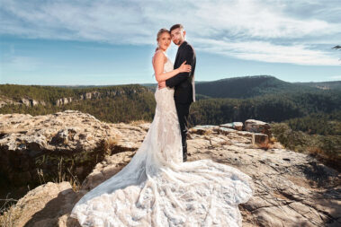 bride and groom at falling rock black hills wedding photographer