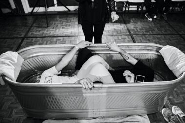 bride and groom baptized together at wedding reception