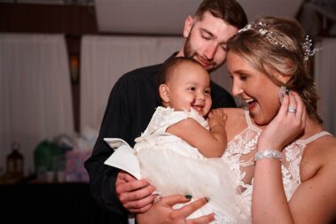 bride and groom dancing with daughter at black hills receptions wedding